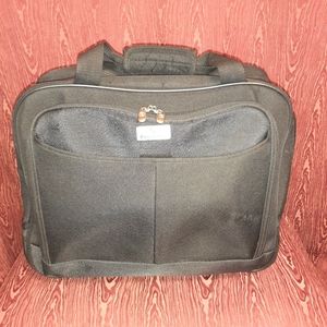 PROTEGE LARGE ROLLING CARRY-ON BAG WITH ADJUSTABLE HANDLES